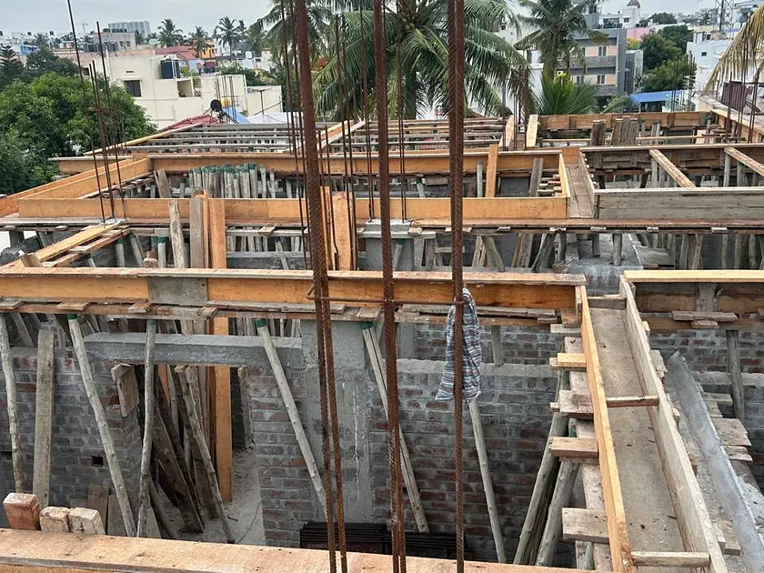 Upper floor slab shuttering with props and reinforcement in place